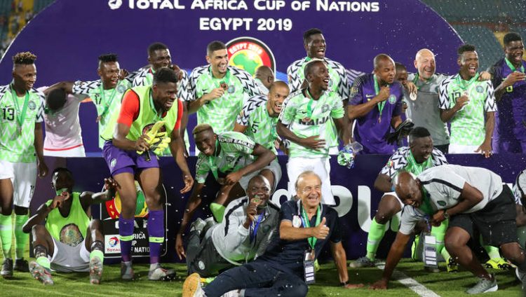 Soccer Football - Africa Cup of Nations 2019 - Third Place Play Off - Tunisia v Nigeria - Al Salam Stadium, Cairo, Egypt - July 17, 2019  Nigeria coach Gernot Rohr celebrates with team mates after winning the Third Place Play Off       REUTERS/Suhaib Salem
