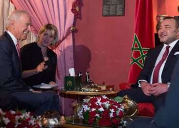 ملك و بايدن