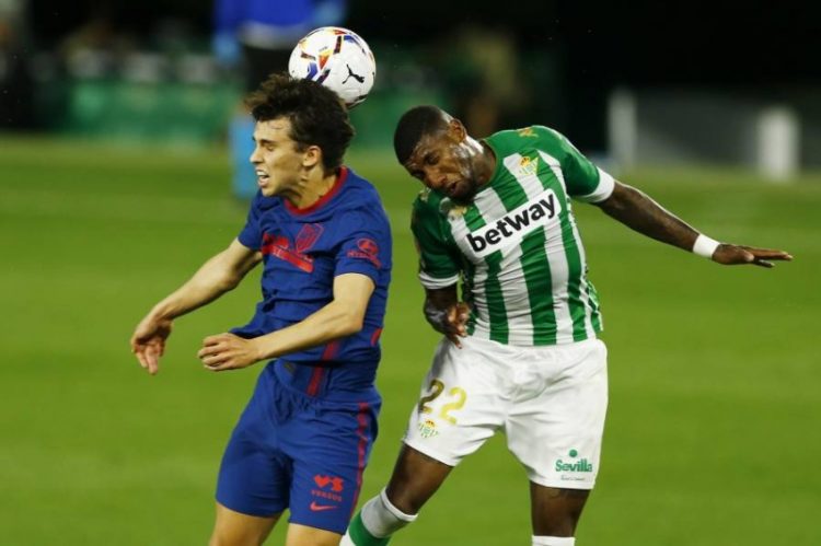 Soccer Football - La Liga Santander - Real Betis v Atletico Madrid - Estadio Benito Villamarin, Seville, Spain - April 11, 2021 Atletico Madrid's Joao Felix in action with Real Betis' Emerson REUTERS/Marcelo Del Pozo