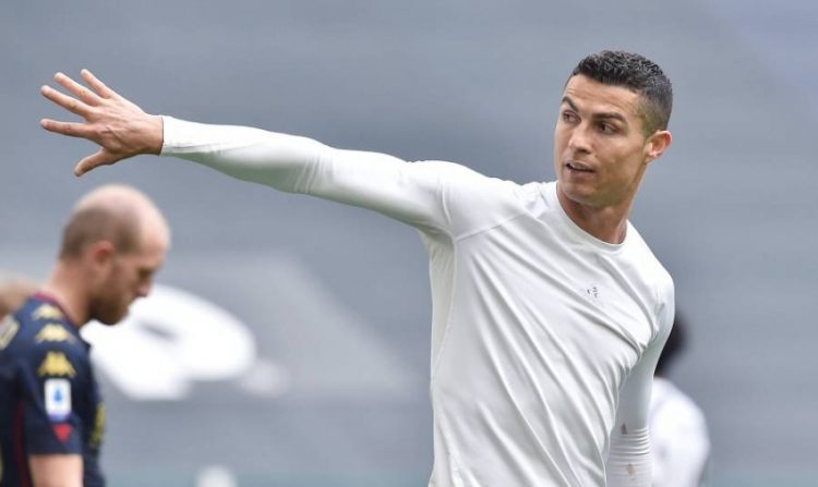 epa09129128 Juventus’ Cristiano Ronaldo reacts at the end of the Italian Serie A soccer match Juventus FC vs Genoa CFC at the Allianz Stadium in Turin, Italy, 11 April 2021.  EPA/ALESSANDRO DI MARCO