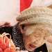 انسحاب أكبر شخص معمّر في العالم من مسيرة الشعلة الأولمبية