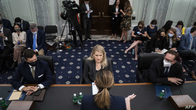 Former Facebook employee and whistleblower Frances Haugen (C) arrives to testify during a Senate Committee on Commerce, Science, and Transportation hearing on Capitol Hill, October 5, 2021, in Washington, DC. (Photo by Jabin Botsford / POOL / AFP)