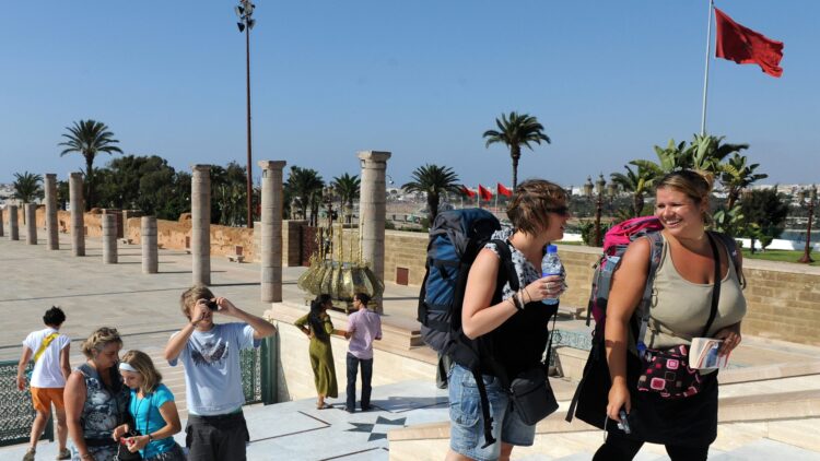 Tourists visit the Mausoleum of Mohamed V in Rabat on July 24, 2012. The economic crisis in Europe has affected the tourism sector in Morocco. AFP PHOTO/FADEL SENNA .        (Photo credit should read FADEL SENNA/AFP/GettyImages)