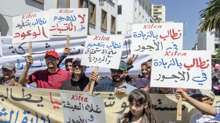 RABAT, MOROCCO - MAY 01 : Workers, organized by labor unions and other labor organization take part in a rally to mark May Day, International Workers' Day in Rabat, Morocco on May 01, 2016. Every year May Day is observed and commemorated all around Morocco. (Photo by Jalal Morchidi/Anadolu Agency/Getty Images)