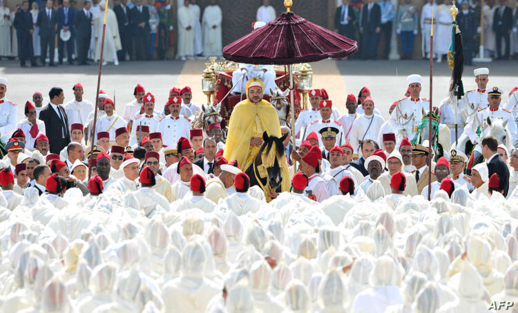 A picture taken on August 21, 2012 shows King Mohammed VI of Morocco parading on horseback on the Mechouar square at the Royal Palace in Rabat, during the "Celebration of loyalty and allegiance" for the 13th anniversary of his accession to the throne. Moroccan government officials pledged their allegiance to King Mohammed VI, bowing down before the monarch at an annual "celebration of loyalty" that activists have criticised as "backward."  AFP PHOTO / AZZOUZ BOUKALLOUCH / AFP PHOTO / AZZOUZ BOUKALLOUCH