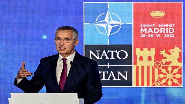 NATO Secretary General Jens Stoltenberg delivers his opening speech on the first day of the NATO summit at the Ifema congress centre in Madrid, on June 28, 2022. (Photo by JAVIER SORIANO / AFP)