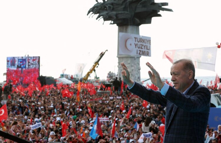 TOPSHOT - A handout photograph taken and released on April 29, 2023 by the Press Office of the Presidency of Turkey, shows Turkish President and Leader of the Justice and Development (AK) Party, Recep Tayyip Erdogan, greeting citizens during an electoral rally at Gundogdu Square in Izmir, on April 29, 2023. Recep Tayyip Erdogan appeared in public on April 29, 2023 for the first time in three days, after a stomach infection kept him off the campaign trail before key polls. - -----EDITORS NOTE --- RESTRICTED TO EDITORIAL USE - MANDATORY CREDIT "AFP PHOTO /HANDOUT/PRESS OFFICE OF THE PRESIDENCY OF TURKEY " - NO MARKETING - NO ADVERTISING CAMPAIGNS - DISTRIBUTED AS A SERVICE TO CLIENTS
 (Photo by HANDOUT / PRESS OFFICE OF THE PRESIDENCY OF TURKEY / AFP) / -----EDITORS NOTE --- RESTRICTED TO EDITORIAL USE - MANDATORY CREDIT "AFP PHOTO /HANDOUT/PRESS OFFICE OF THE PRESIDENCY OF TURKEY " - NO MARKETING - NO ADVERTISING CAMPAIGNS - DISTRIBUTED AS A SERVICE TO CLIENTS