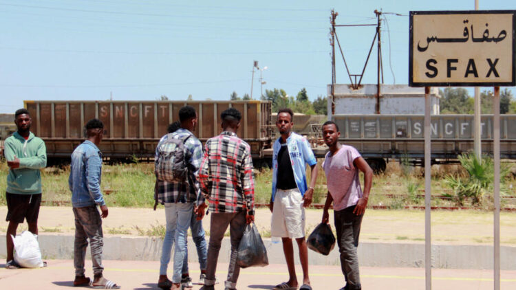 African migrants wait for the train in the Sfax railway station on July 5, 2023 to reach the capital Tunis  after the burial of a young Tunisian stabbed to death during a scuffle between residents and migrants from sub-Saharan Africa, Three African migrants were arrested as suspects in the stabbing death of the local man, a court spokesman said on July 4 in Tunisia's second-largest city, which is a departure point for many migrants hoping to reach Italy.
HOUSSEM ZOUARI / AFP
