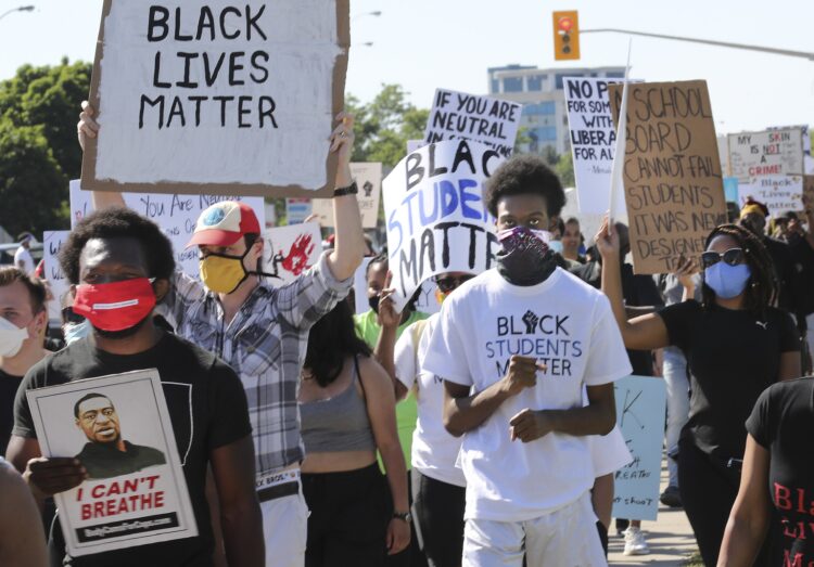 TORONTO, ON - JUNE 17: A student-led march against racism was held Wednesday afternoon at the Peel District school board. The March for Justice focussed on the issue of anti-black racism in Ontario's school system. March started at 4:30 p.m. the A. Grenville and William Davis Courthouse, on Hurontario St. in Brampton and ended at the Peel District School Board.        (Richard Lautens/Toronto Star via Getty Images)