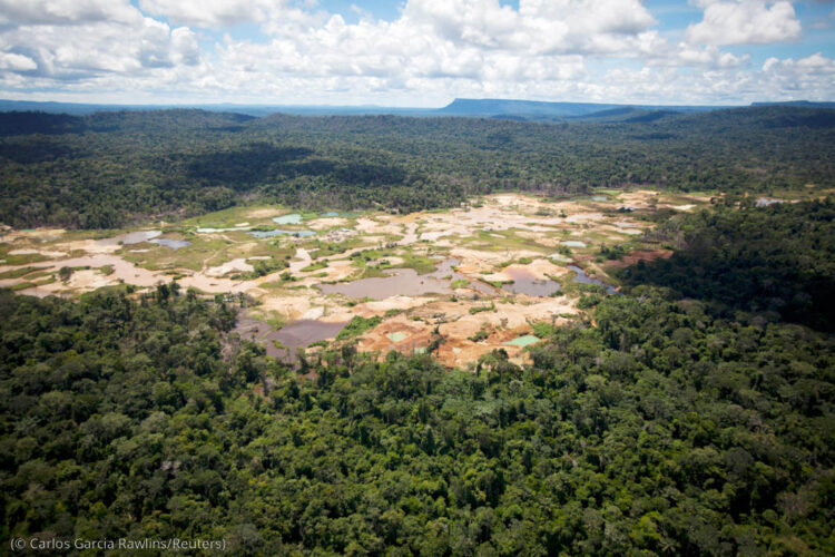 An aerial view of the environmental damage caused by illegal mining at the Canaima National Park in southern Bolivar state June 17, 2010. Venezuela's army has evicted thousands from makeshift towns in one of the world's most pristine jungles, where wildcat miners tempted by high gold prices rip down trees and blast mercury into mud. An official said they have stopped one ton of gold and 5000 karats of diamonds from being produced monthly.  Picture taken June 17, 2010.  REUTERS/Carlos Garcia Rawlins (VENEZUELA - Tags: ENVIRONMENT ENERGY POLITICS SOCIETY CRIME LAW BUSINESS) - GM1E66U0KXP01