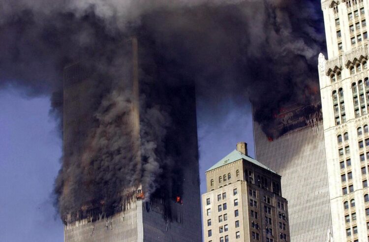 (FILES) (FILES) In this file photo smoke billows from the twin towers of the World Trade Center in lower Manhattan, New York on September 11, 2001. A proposal to allow alleged perpetrators of the 9/11 attacks to plead guilty and avoid the death penalty poses a powerful dilemma for victims' families, some of whom still want to seek the ultimate retribution after two decades of legal limbo. The proposal detailed by prosecutors in a letter this month could offer families of the nearly 3,000 victims the best path to a resolution of a case bogged down in pre-trial maneuverings in the Guantanamo military commissions for years -- and with no end in sight.
 - 
 (Photo by STAN HONDA / AFP)