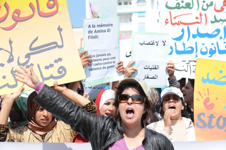 Fouzia Assouli, president of Morocco's Democratic League for Women's Rights and 300 protesters stage a sit-in outside the local court in Larache that had approved the marriage on March 15, 2012.  Amina al-Filali, 16, drank rat poison last week in Larache, near Tangiers in the north, after being forced to marry the man who raped her. AFP PHOTO / ABDELHAK SENNA / AFP PHOTO / ABDELHAK SENNA