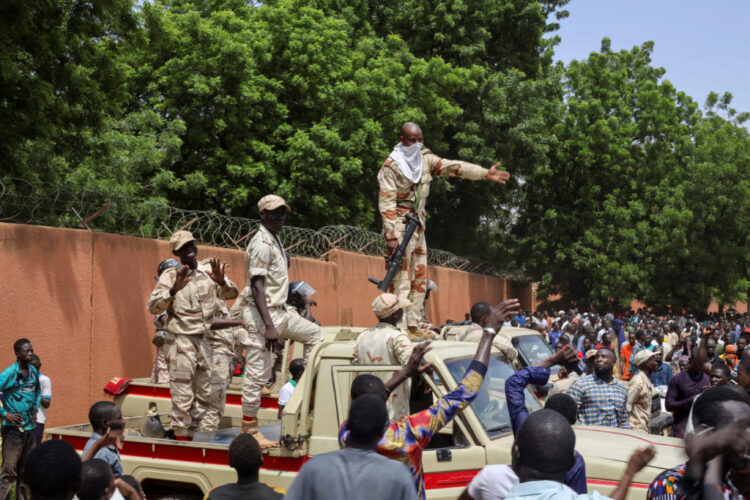 Nigerien security forces prepare to disperse pro-junta demonstrators gathered outside the French embassy, in Niamey, the capital city of Niger July 30, 2023. REUTERS/Souleymane Ag Anara REFILE – CORRECTING NATIONALITY NO RESALES. NO ARCHIVES. REFILE - QUALITY REPEAT