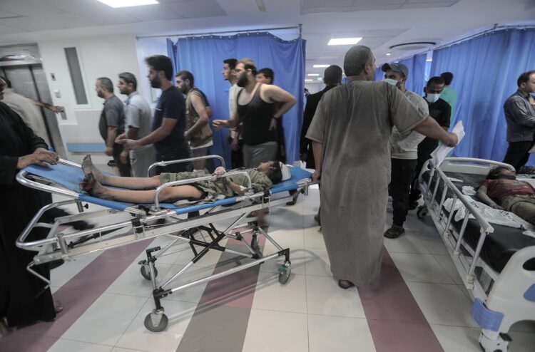 epa10914072 Wounded Palestinians lie on stretchers at Al-Shefa hospital in Gaza City, 11 October 2023. More than 1,000 Palestinians have been killed and over 5,000 others injured, according to the Palestinian Ministry of Health, after Israel started bombing the Palestinian enclave in response to attacks carried out by the Islamist movement Hamas on Israel from the Gaza Strip on 07 October. More than 3,000 people, including 1,500 militants from Hamas, have been killed and thousands injured in Gaza and Israel since 07 October, according to Israeli military sources and Palestinian officials.  EPA/HAITHAM IMAD