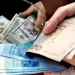 الدرهم يرتفع مقابل الدولار