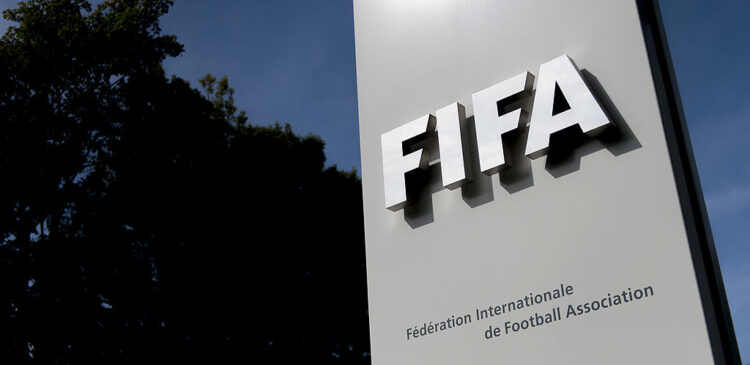 The logo of the global football's governing body FIFA is seen on October 3, 2013 at its headquarters in Zurich. FIFA kicked off a crunch meeting behind closed doors, amid claims of rights abuses by 2022 World Cup Qatar and wrangling over plans to hold the tournament in the winter.  AFP PHOTO / FABRICE COFFRINI        (Photo credit should read FABRICE COFFRINI/AFP/Getty Images)