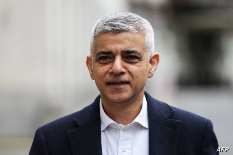 Mayor of London Sadiq Khan reacts during the launching of a new poster campaign, in central London, on March 25, 2024 ahead of the London mayoral elections. (Photo by Daniel LEAL / AFP)