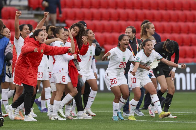 Morocco players celebrate following the Women's World Cup Group H soccer match between South Korea and Morocco in Adelaide, Australia, Sunday, July 30, 2023. (AP Photo/James Elsby)